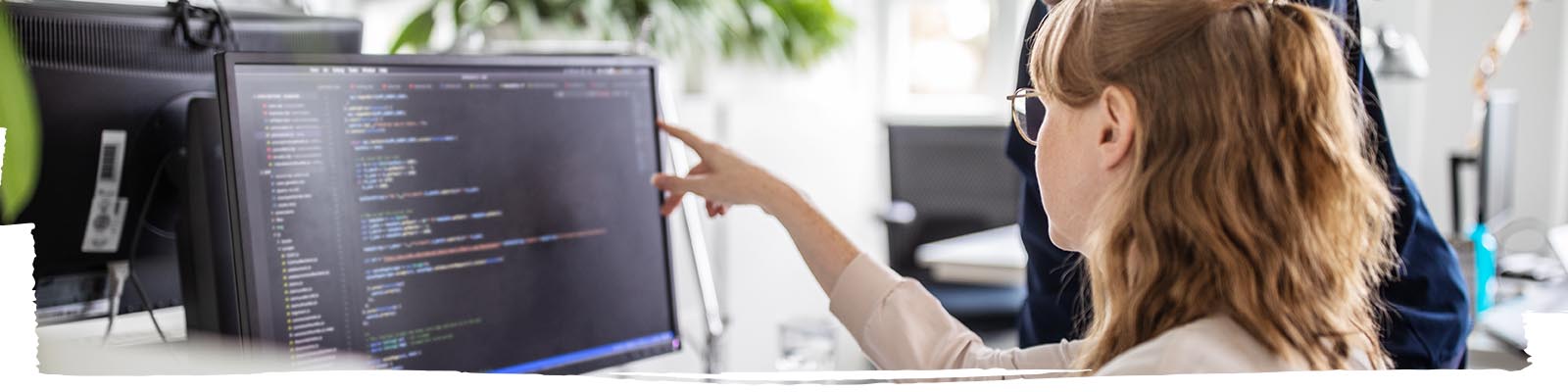 Women's discussing about code