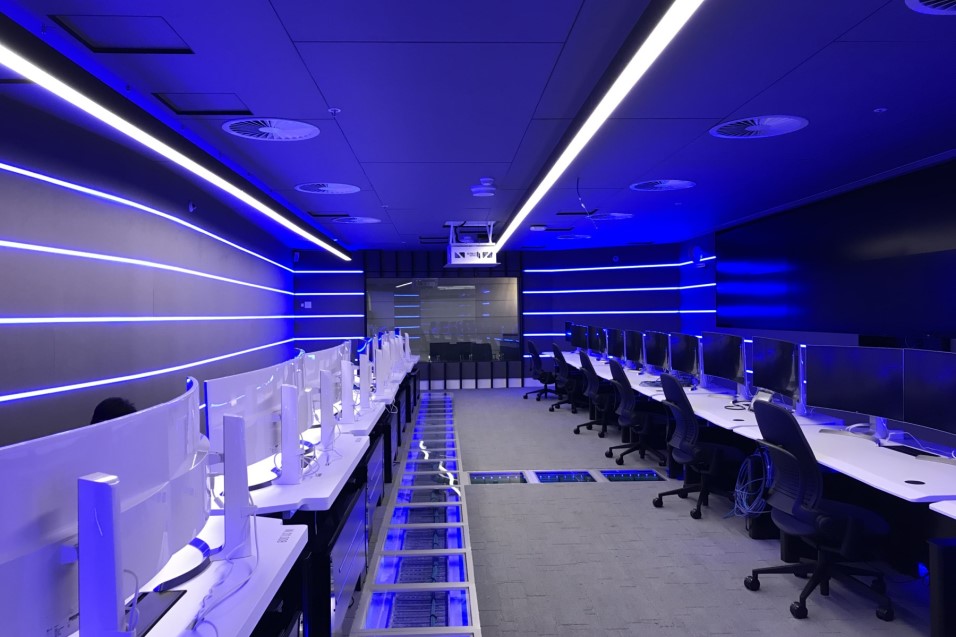 Cyber security room with desks