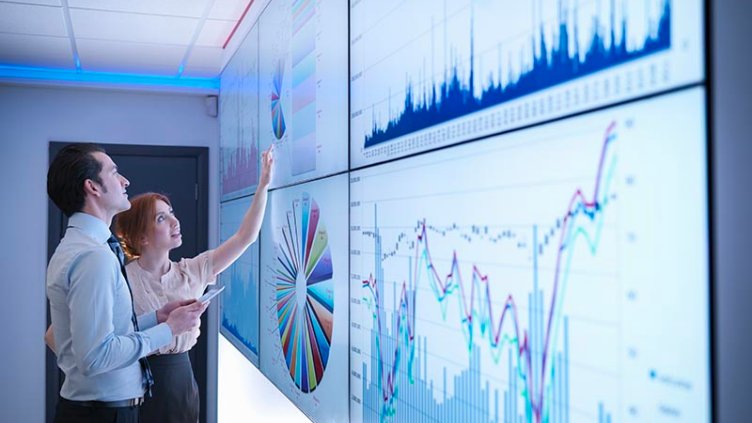 Employees checking the presentation 