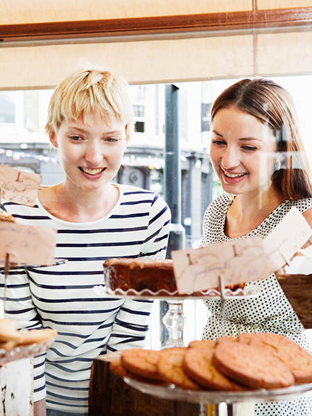 young girls on food retail shop