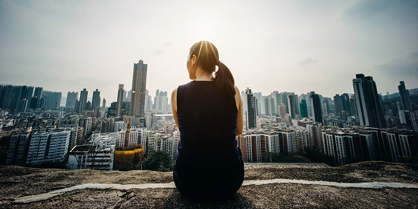 Women sitting and enjoying the city view