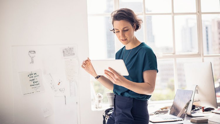 Business women working with tablet and laptop in the office