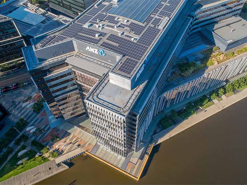 Aerial view of ANZ building with solar panel on rooftop