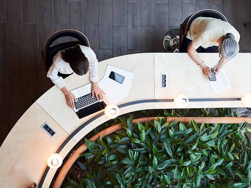 Top view of employees working inside the office premises