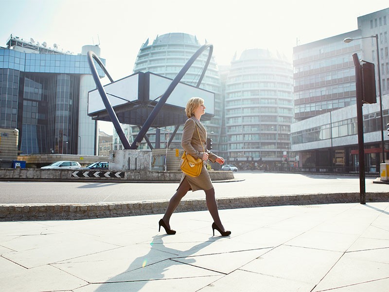 Woman wearing formals and way to office